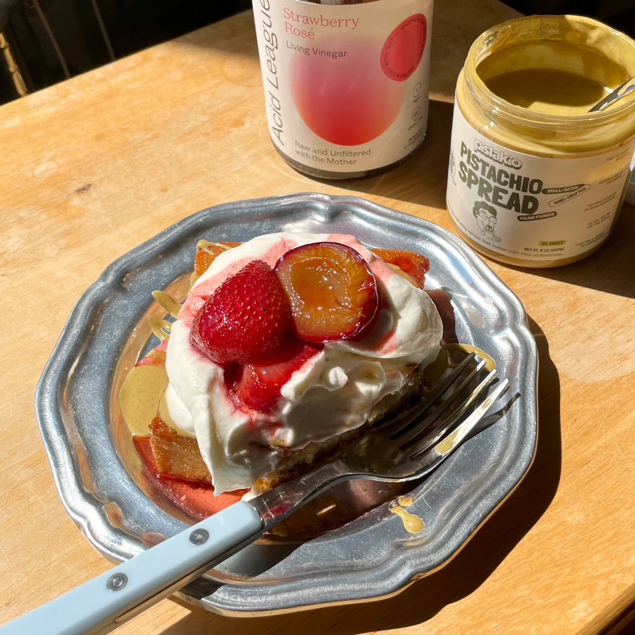 CRISPY HONEY BUTTER TOAST WITH ROASTED STRAWBERRIES & PLUMS