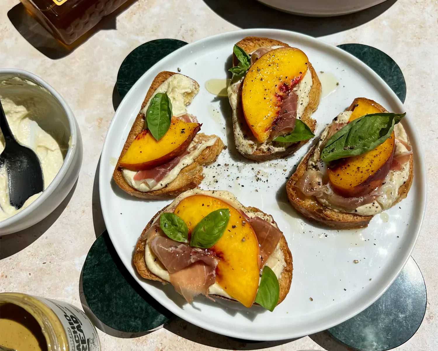 peach bruschetta with whipped pistachio ricotta