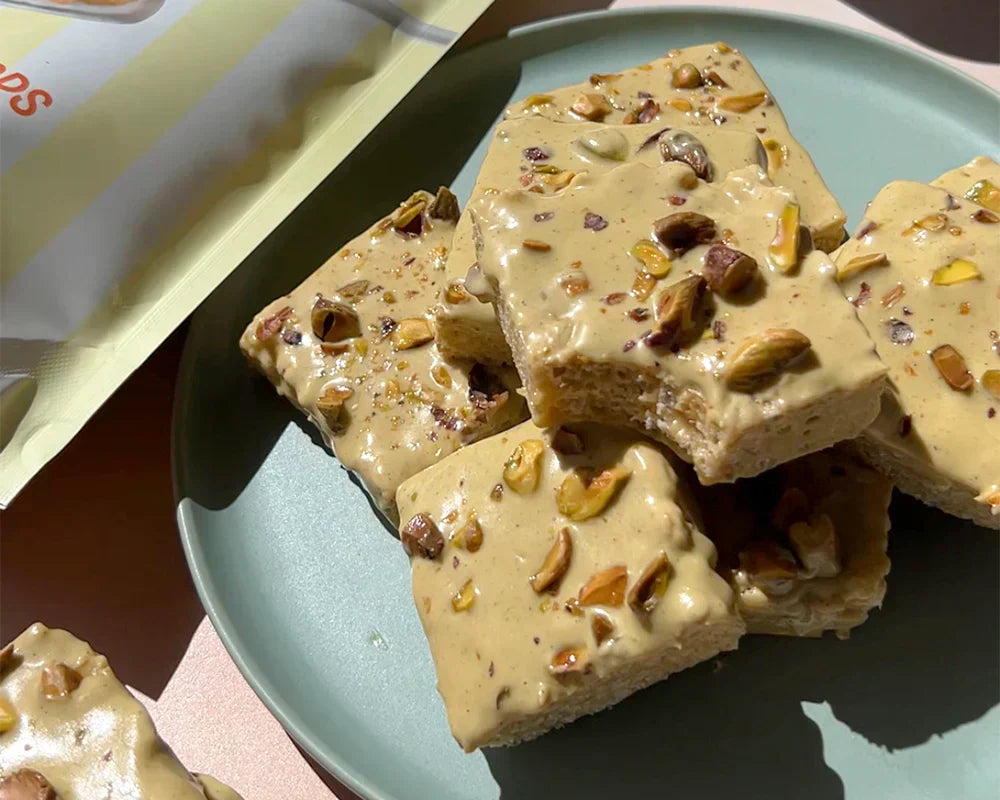 pistachio rice krispie treats with cereal, marshmellows, and chopped pistachios