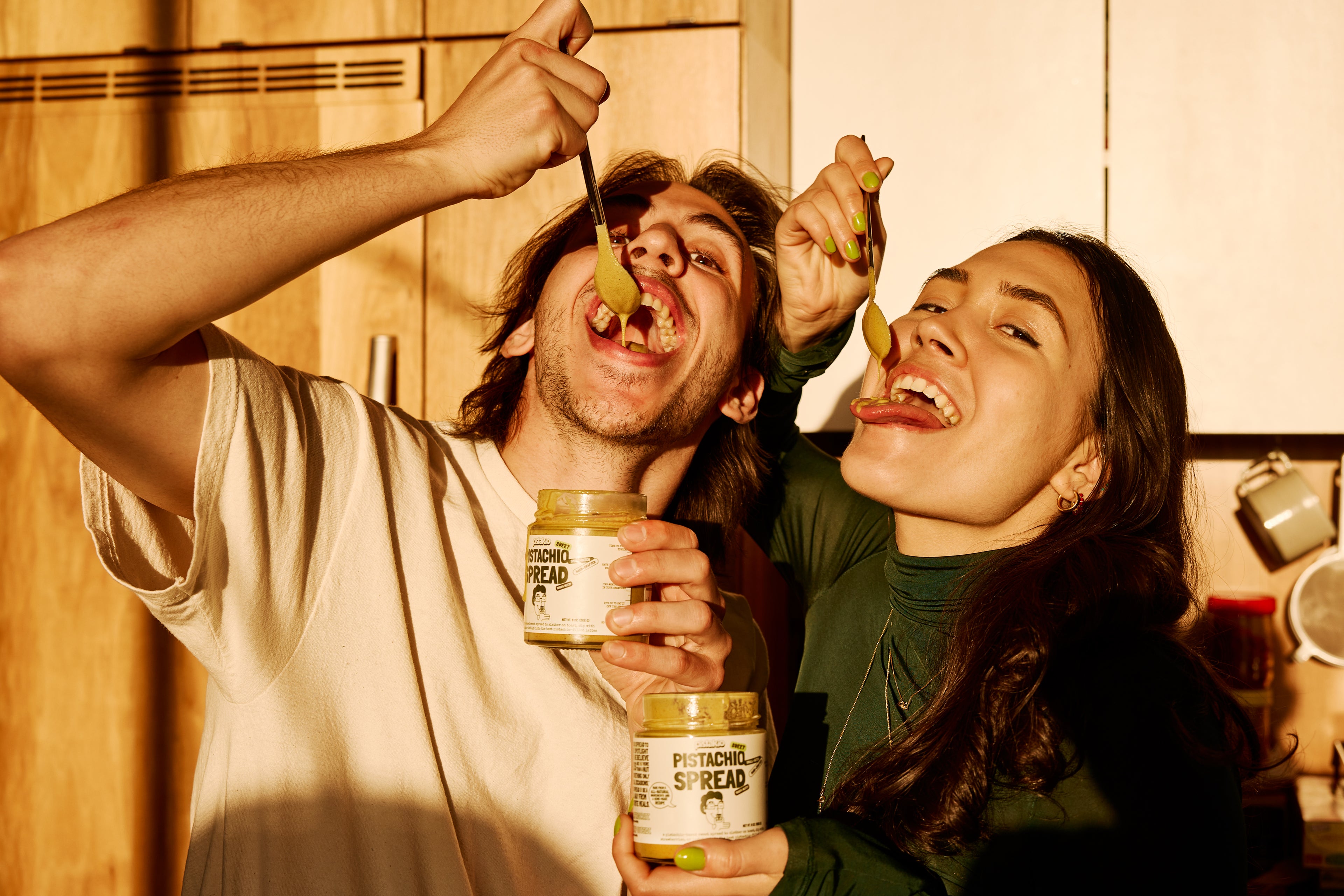 founders of pistakio eating pistachio spread